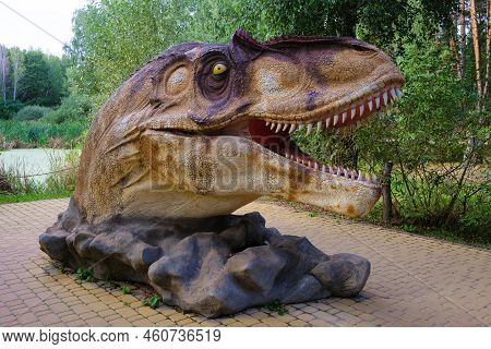 Belgorod, Russia - September 06, 2021: Photosaur Attraction Statue In The Belgorod Dinopark. Head Of