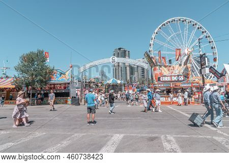 Calgary, Alberta, Canada - July 15, 2022: People Enjoy The Calgary Stampede At The Stampede Park In 