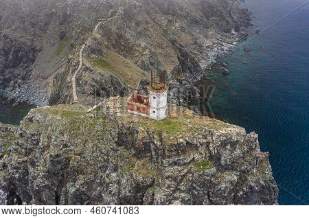 An Old Ruined Lighthouse On Askold Island In The East Sea. A Beautiful Ruined Staircase Leading To T