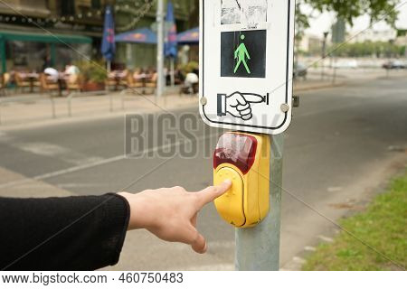 Hand Pressing Button To Cross The Road