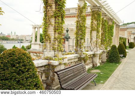 Beautiful City Landscape Behind An Empty Bench