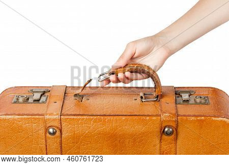 A Suitcase With A Torn Handle. A Womans Hand Holds A Torn-off Handle Of A Suitcase.