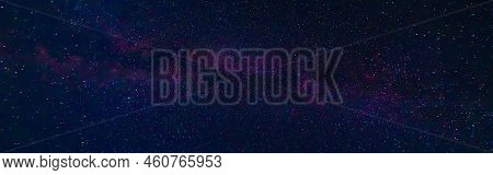 Tellar Milky Way At Night With Stars. Panorama Of The Dark Blue Starry Sky