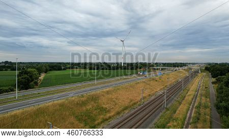 Brecht, Belgium, 6th Of July, 2022, Panoramic Aerial Drone View Of Wind Farm Or Wind Park, With High