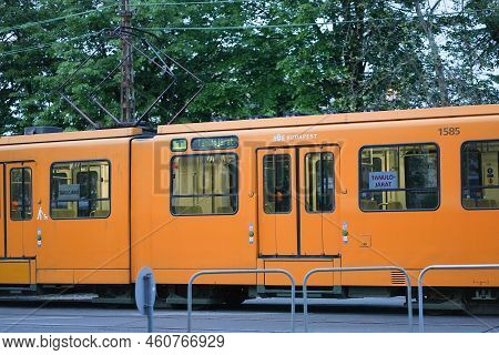 Middle Part Of An Old Tram Passing In The Suburban Area Of A City