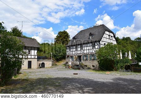 Roes, Germany 08 16 2022: Medieval Mill Pyrmonter Mühle, Closed Restaurant