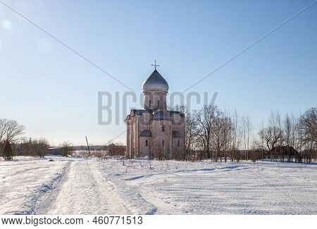 Saviour Church On Nereditsa In Velikiy Novgorod Vicinity, Russia. Winter Countryside Landscape With 