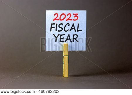 2023 Fiscal Year Symbol. White Paper With Words 2023 Fiscal Year, Clip On Wooden Clothespin. Beautif