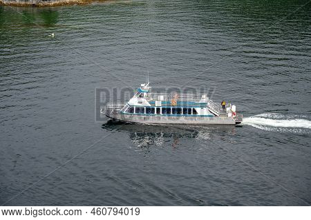 Sitka, Alaska - July 26, 2022 - View Of Adventure Sitka's  Kalinin Express Cruise Boat Picking Up Ka