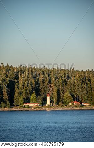 Cape Mudge Lighthuse And Beautiful Landscape On Quadra Island. View From Cruise Ship.