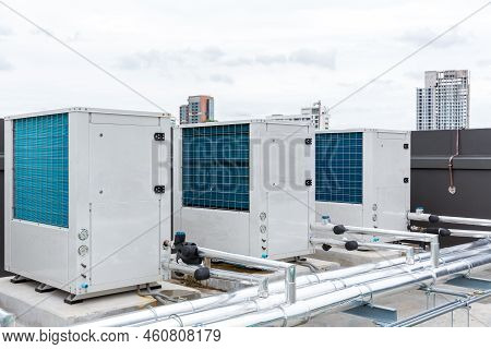 Air Conditioner Compressor Installed On Roof Building. Industrial Air Conditioning Units. Industrial