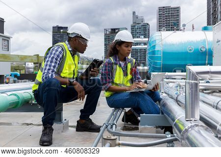 Industrial Engineer Work On Site. Engineer Visit And Inspection Site Engineer At Industrial Site. In