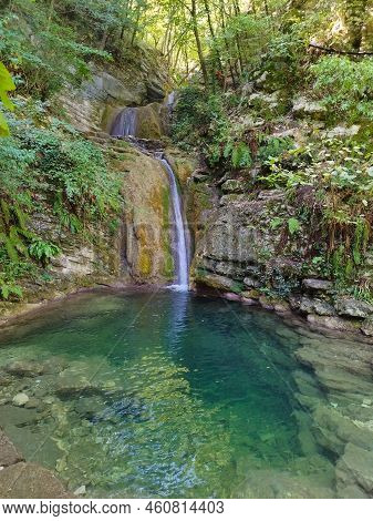 View Of Idyllic Little Waterfall In The Forest Near Cagli In The Marche Region, Italy