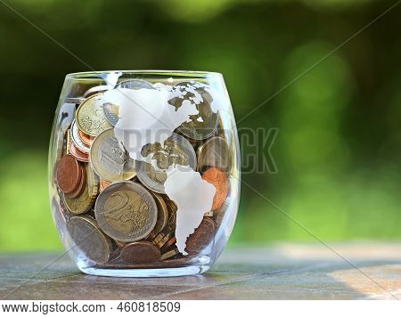 Euro Coins Collected For Vacation In Glass Jar With America Map Inprint, Green Blured Background, Sa