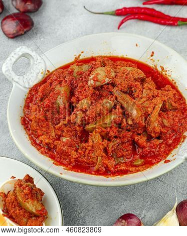 Made From Chilies And Onions, Then Given Anchovies Or Pieces Of Petai Or Jengkol. When Stirred Toget