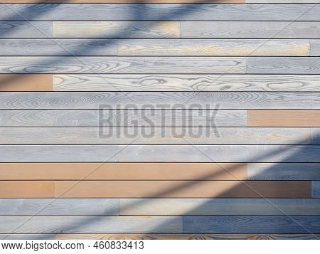 Terrace Board Floor Outdoor Background Texture. Shadow On Deck Board. The Floor Of The Veranda Is Li