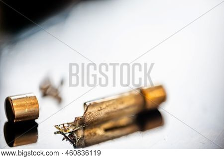 Brown Damaged Fuse That Has Blown And Defective.
