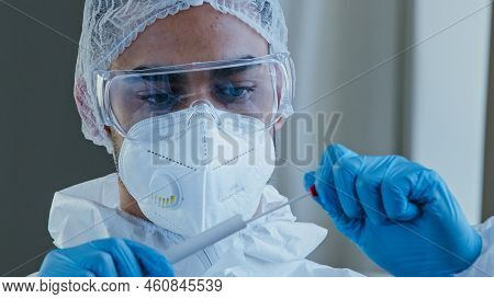 Portrait Arabic Hispanic Man Doctor Medical Worker In Ppe Protective Suit Performed Congestion Swab 