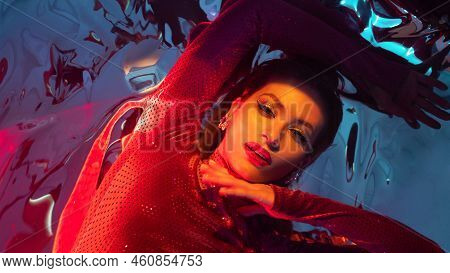 Portrait Of A Young Beautiful Woman On A Shimmering Silver Background, Iridescent Colored Light, Fut