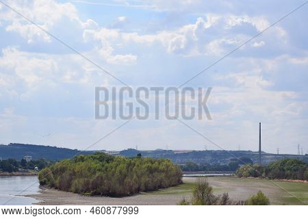 Dry Rhine On One Side Of The Island Urmitzer Werth With The Nuclear Plant Chimney