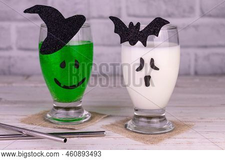 Halloween Drink Idea. Freak Monster Cocktail. The Face Of The Monster And Fireworks On The Glass.