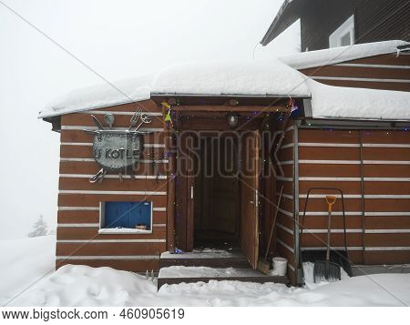 Vitkovice, Czech Republic, December 5, 2021: Entrance Door Of Mountain Hut Called U Kotle Krkonose M