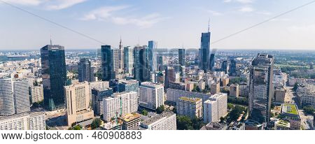 7.22.2022 Warsaw, Poland. Wide Panoramic Drone Shot. Variety Of Skyscrapers In Warsaw Skyline. Socia