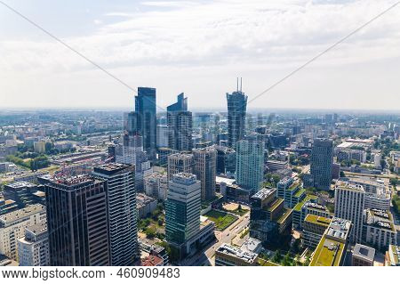 7.22.2022 Warsaw, Poland. Neomodern Architecture Represented By Skyscrapers. Aerial Drone Shot With 