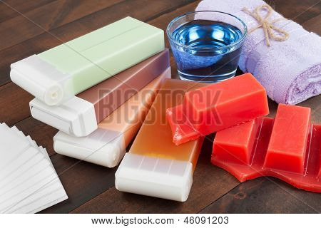 Cera para depilação, toalha e óleo