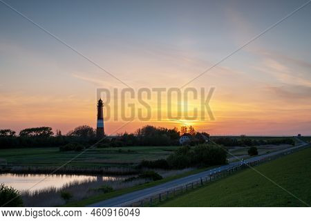 Panoramic Image Of Pellworm Lighthouse Against Sunrise, North Frisia, Germany