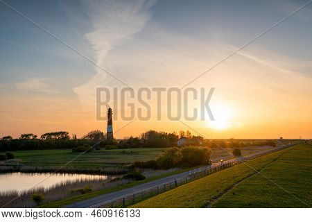 Panoramic Image Of Pellworm Lighthouse Against Sunrise, North Frisia, Germany