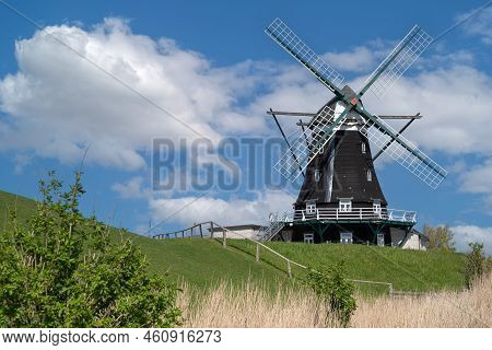 Panoramic Image Of The Windmill Of Pellworm Against Blue Sky, North Frisia, Germany