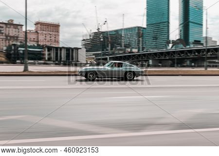 Chevrolet Corvette C2 Oldtimer Car Fast Moving On City Street. Moscow, Russia - June 2022