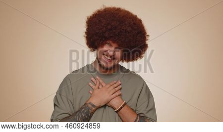 Joyful Man With Lush Hairstyle Laughing Out Loud After Hearing Ridiculous Anecdote, Funny Joke, Feel