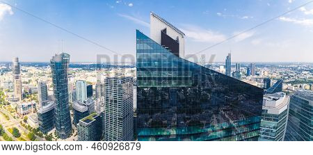 7.22.2022 Warsaw, Poland. Wide Panoramic Shot Of The Pointed Top Of Skyliner Skyscraper In Warsaw. B
