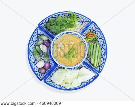 Crab Chili Paste Dip With Coconut Milk With Fresh Vegetables On Tradition Blue And White Plate.