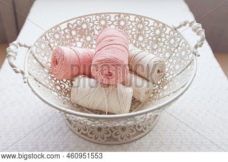 Handmade Macrame Braiding And Cotton Threads In Basket On White Background. Cotton Macrame Cords And