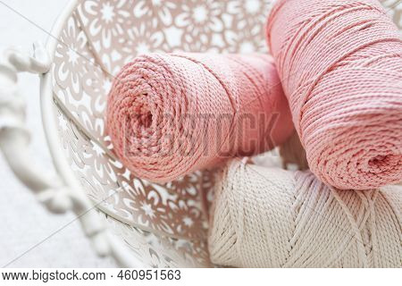 Handmade Macrame Braiding And Cotton Threads In Basket On White Background. Cotton Macrame Cords And