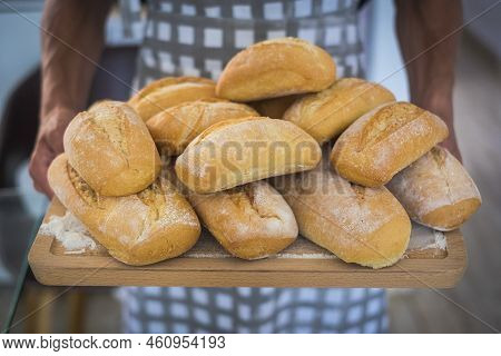 Bakery And Fresh Ready Made Bread Concept - Adult Man Standing With Food - Atisan Work And Worker - 
