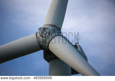 Close-up Of The Hub Of A Wind Turbine. Blade And Hub Of A Wind Turbine.