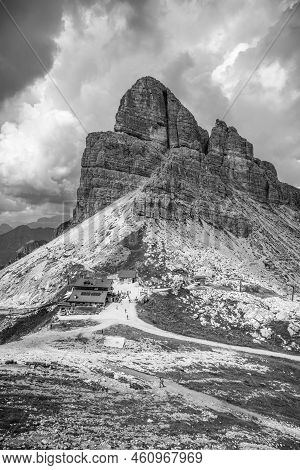 Averau Mountain And Rifugio Averau In Dolomites, Italy. Black And White Image.