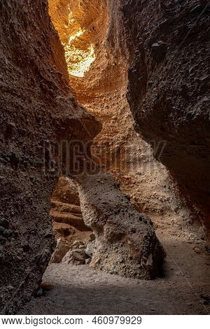 Sunlight Begins To Enter Archway Room In Sidewinder Canyon In Death Valley National Park
