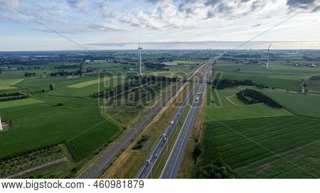 Brecht, Belgium, 6th Of July, 2022, Panoramic Aerial Drone View Of Wind Farm Or Wind Park, With High