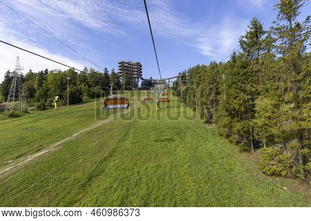 View Of Chairlift To The Mountain With Observation Tower Located At The Top Of The Słotwiny Arena Sk