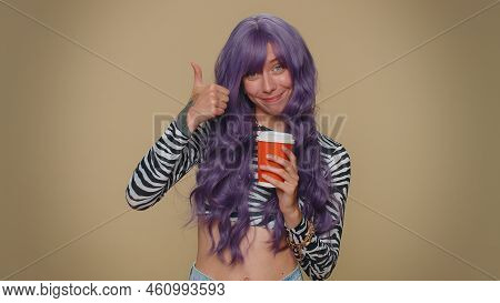 Positive Pretty Young Woman Drinking Coffee From Cup. Adult Stylish Girl Enjoying Hot Beverage In Pa