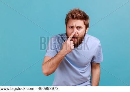You Are Liar. Portrait Of Shocked Bearded Man Standing, Touching His Nose And Showing Lie Gesture, S