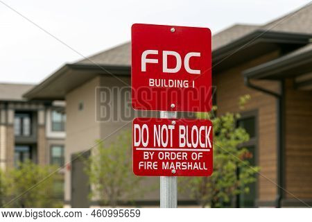 Information Sign With Inscription: Fdc Building 1, Do Not Block By Order Of Fire Marshal, Trees And 