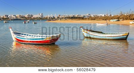 Fishing Boats In The Bay Of The Village Of Ferragudo. Portugal.