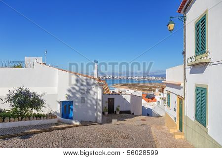 Ancient Street Ferragudo Overlooking The River. Portugal, Portimao.