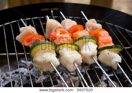 Fish Spear Grilling On Barbecue